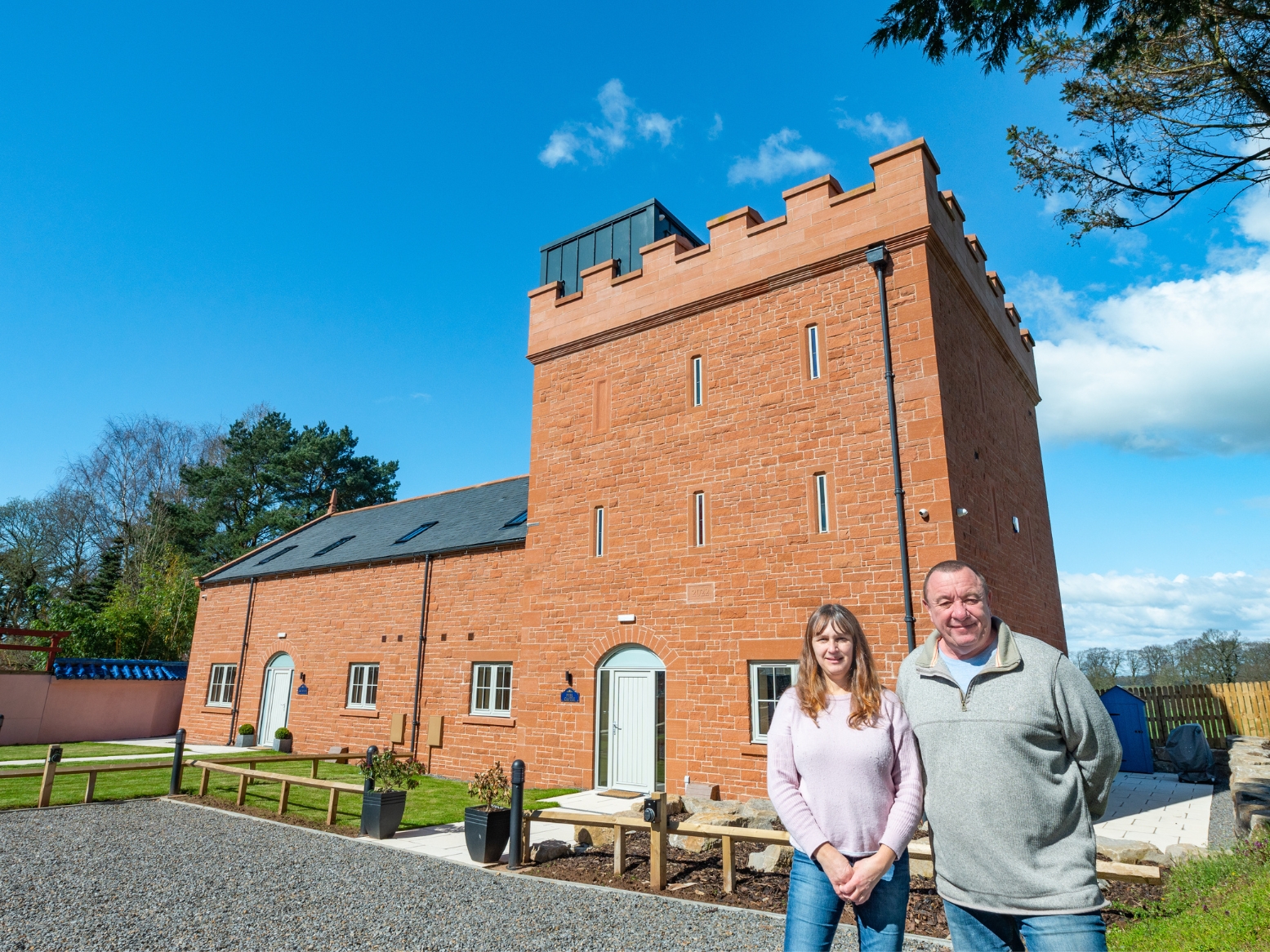 Owners Gordon and Dawn McGregor stand in front of their royal creation