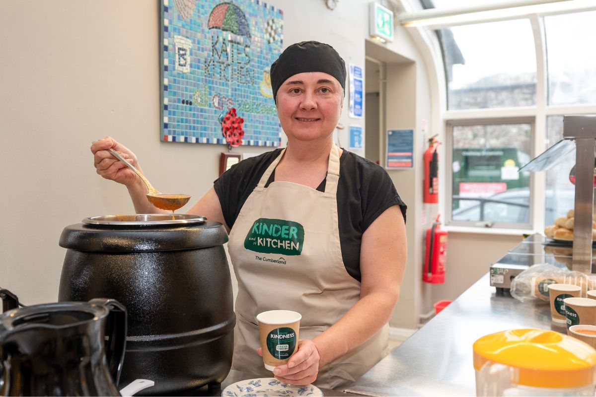 Kate’s Kitchen volunteer Inna serving up soup on World Kindness Day in 2024