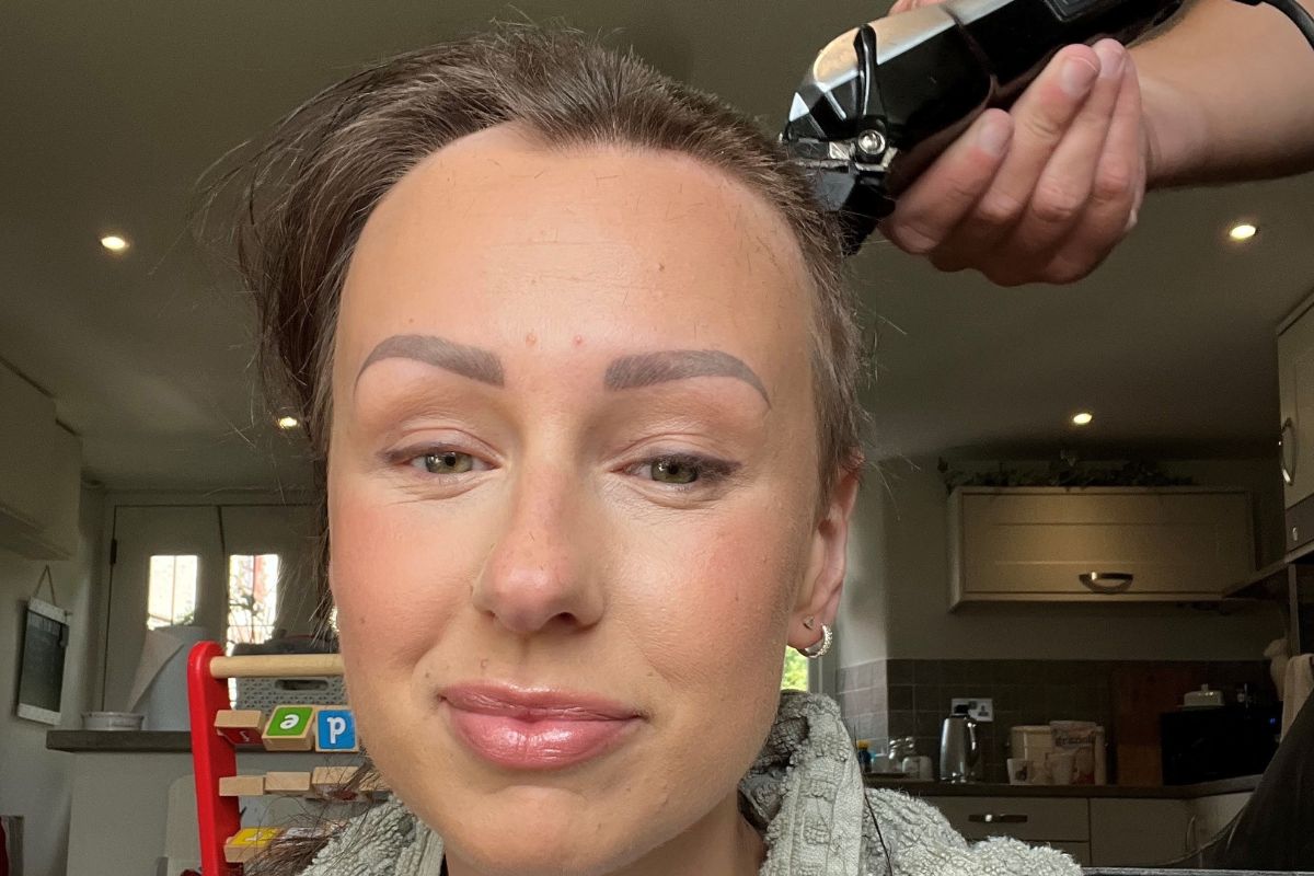 Image of Rebecca Gibson shaving her head