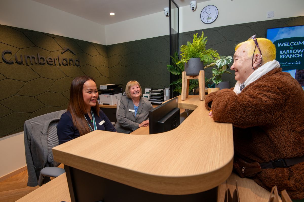 A customer in The Cumberland's new look Barrow branch