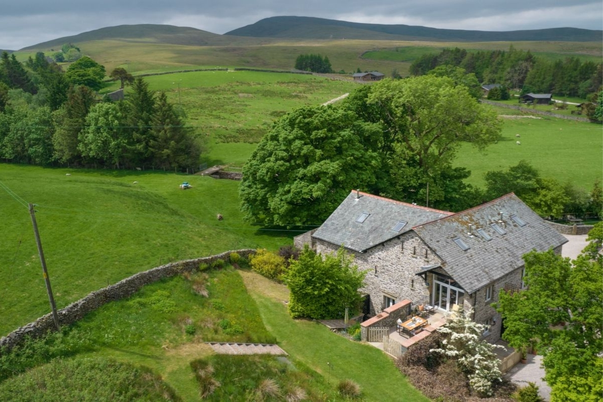 Holiday cottage surrounded by farmland.