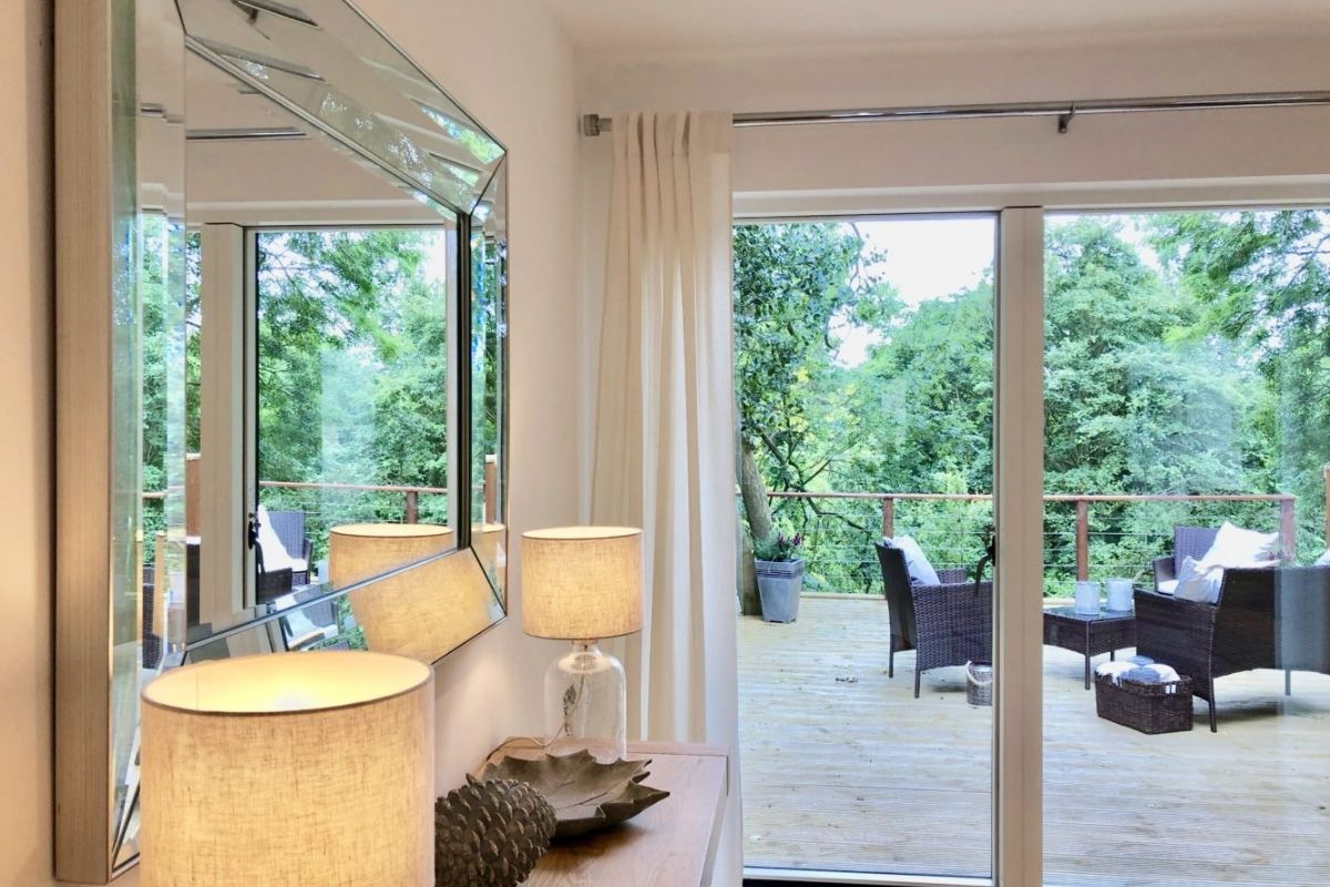 Bring the outside in with mirrors. Amelia Wilson